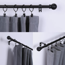Thestoa matte black curtain rods with a modern finish for interior spaces.