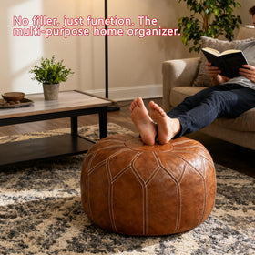 Thgonwid outdoor-friendly leather ottoman for patios and balconies.