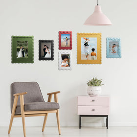 THKRLOF green lifestyle frame shown on wall with photo display