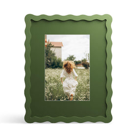 THKRLOF 8x10 green frame with mat displaying a 5x7 photo for elegant display.