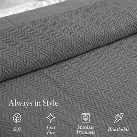Threadmill all-season blanket on couch and bed for year-round comfort.
