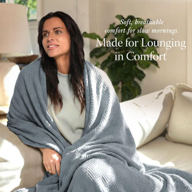 Threadmill all-season blanket ideal for car, couch, or bed with versatile comfort