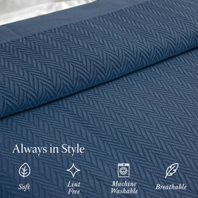 Threadmill blanket folded on sofa highlighting soft cotton touch