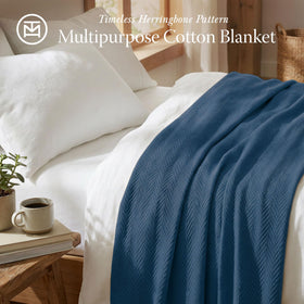 Threadmill king-size blanket with herringbone weave detail on bed