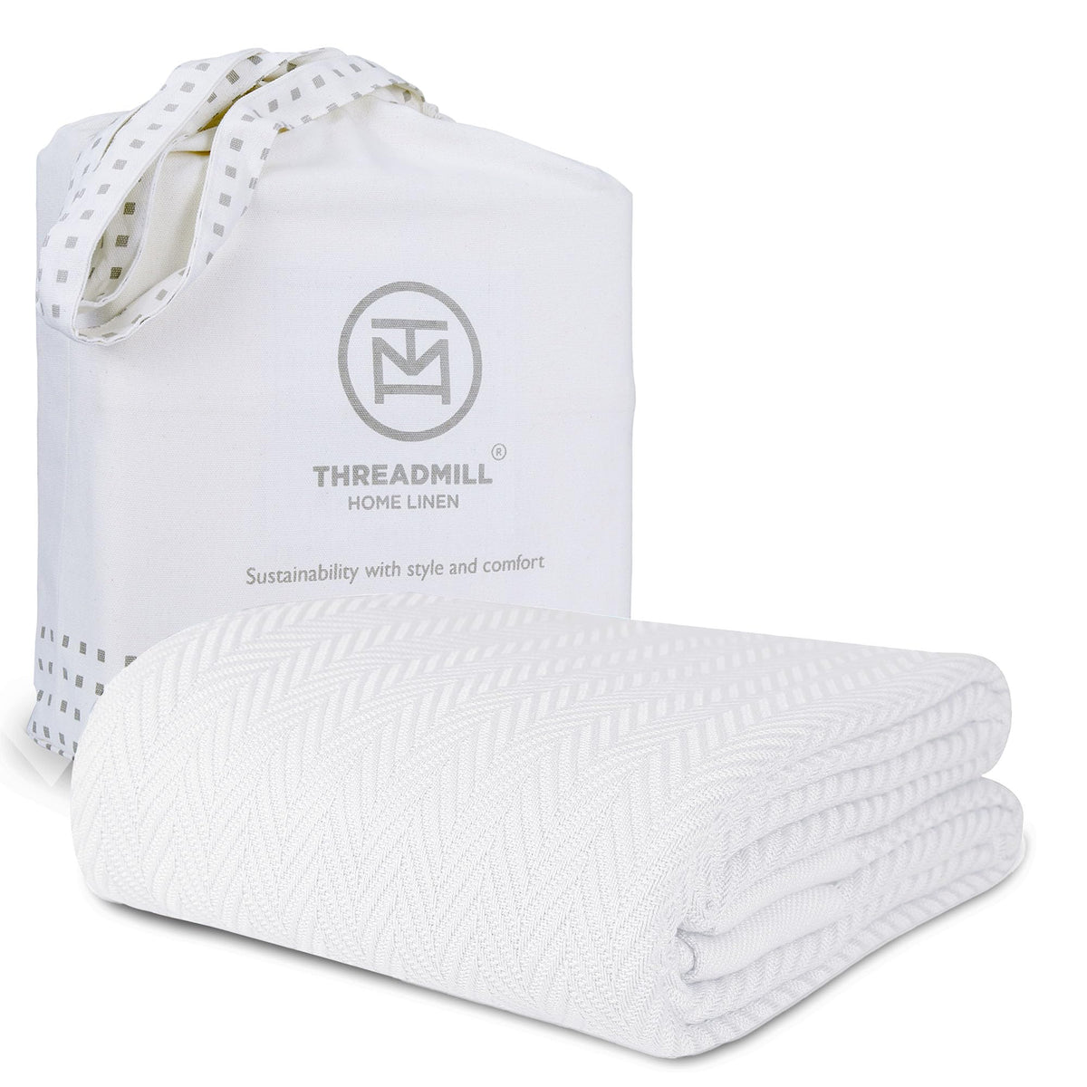 Threadmill luxury cotton blanket on a queen bed offers cozy softness for all-season comfort.