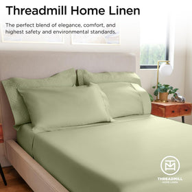 Threadmill Sage Green bed setup featuring coordinated 600TC sheets.