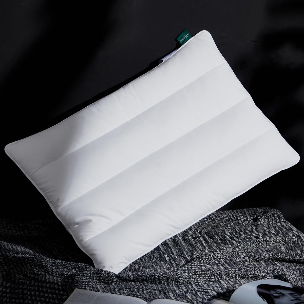 Three Geese luxury flat-down pillow top view showing slim profile and natural support