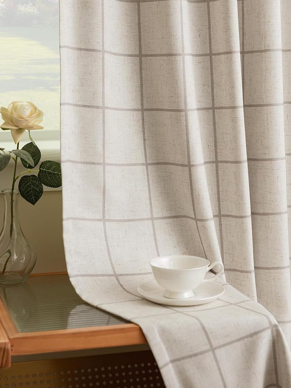 Three Girls pinched-pleat curtains close-up showing structured folds for elegant living room styling.