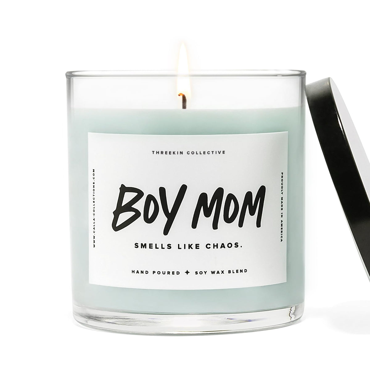 ThreeKin Collective candle lit with driftwood scent for unwinding after a long day.