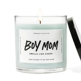 ThreeKin Collective candle lit with driftwood scent for unwinding after a long day.