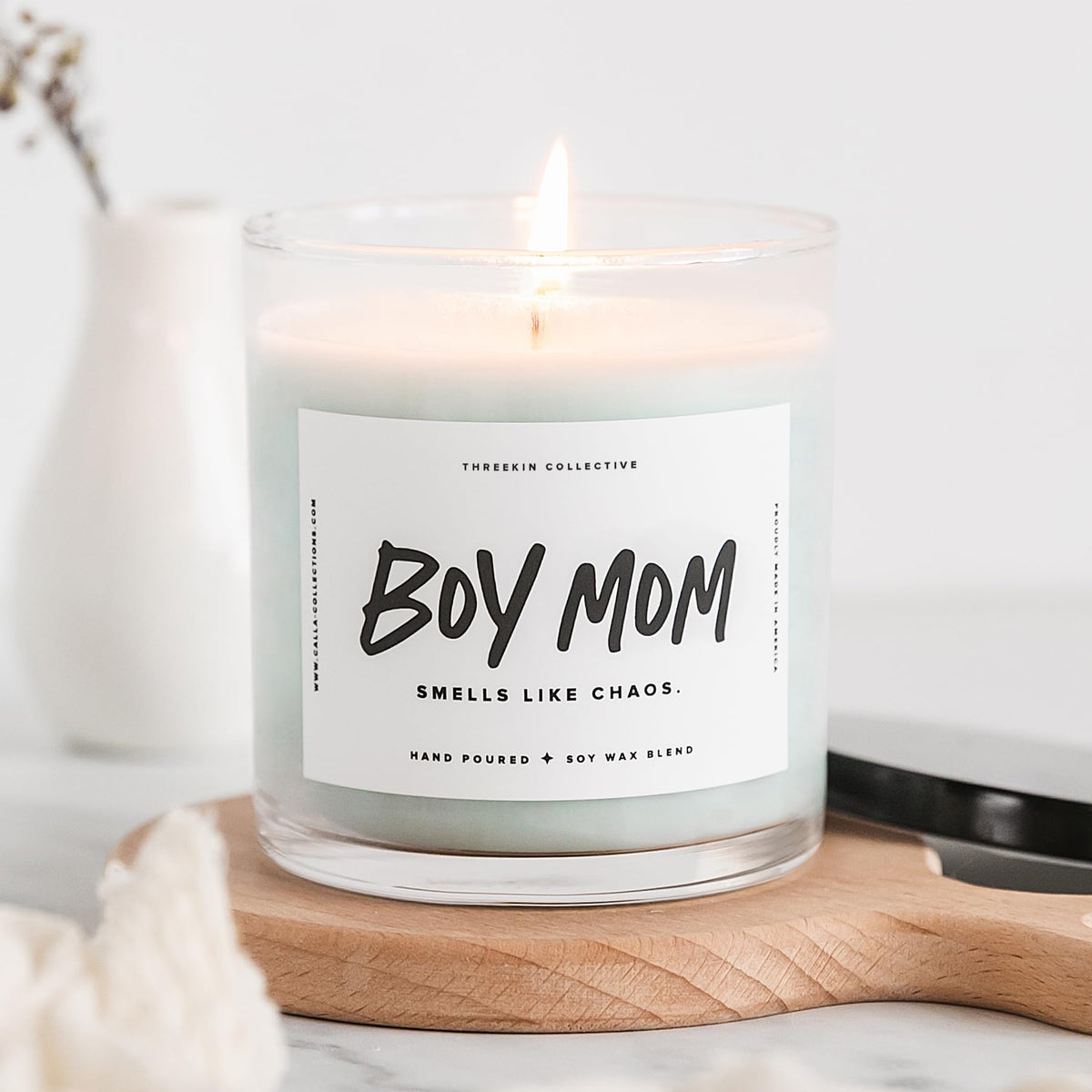 ThreeKin Collective candle packaging shown as gift-ready for thoughtful surprises.