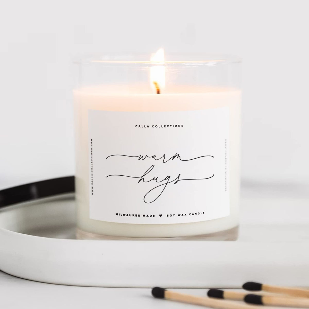 ThreeKin Warm Hugs candle jar with lavender-lemongrass aroma for calm evenings
