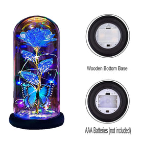 Thrjia glass dome rose with LED strip adds elegant bedside glow.