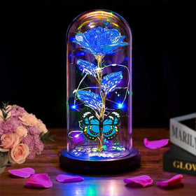 Thrjia light-up rose in glass dome with ambient glow for any room.