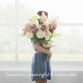 Premium packaging display hints at luxury room fragrance by Thymes.
