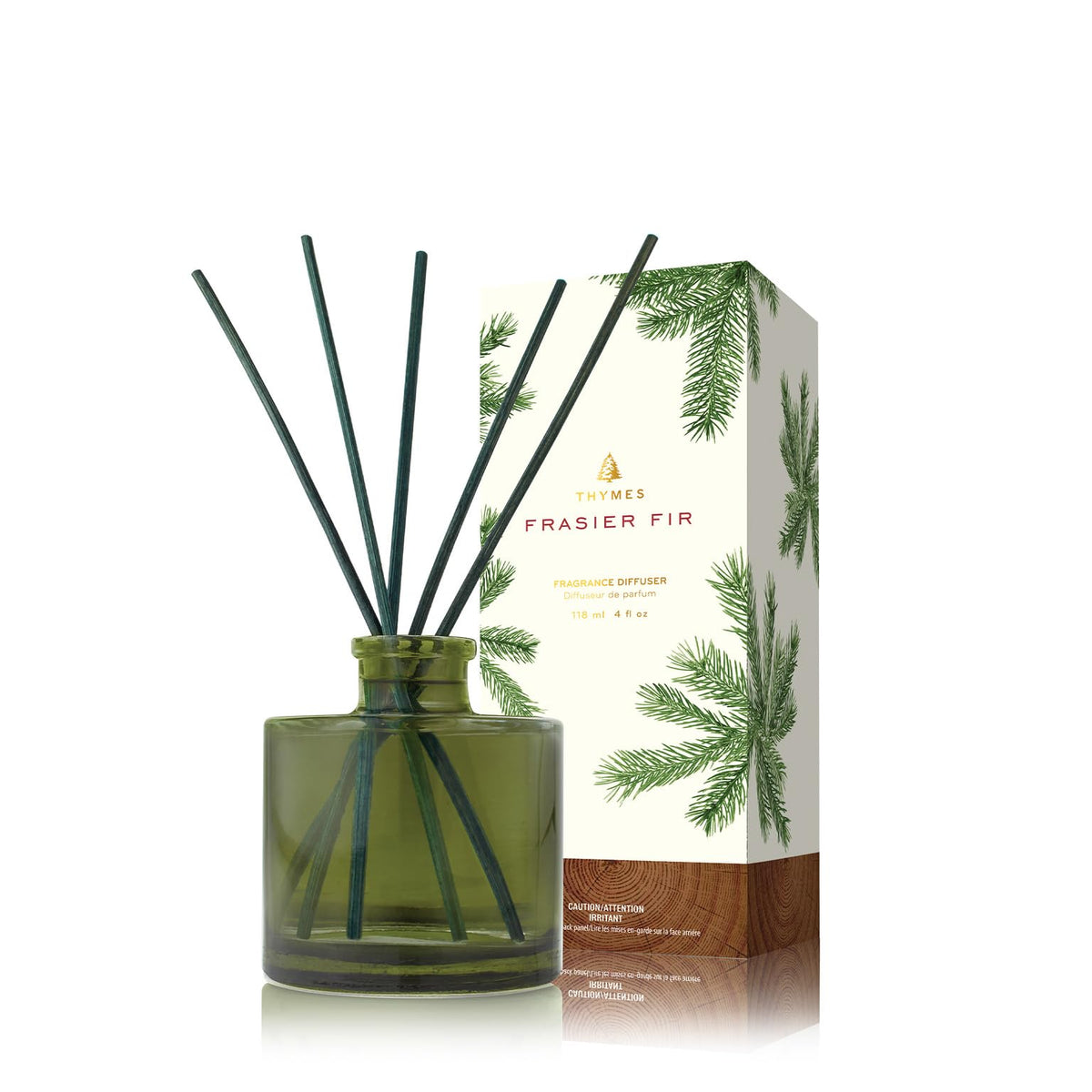 Thymes Frasier Fir diffuser in a green bottle enhances any room ambiance.