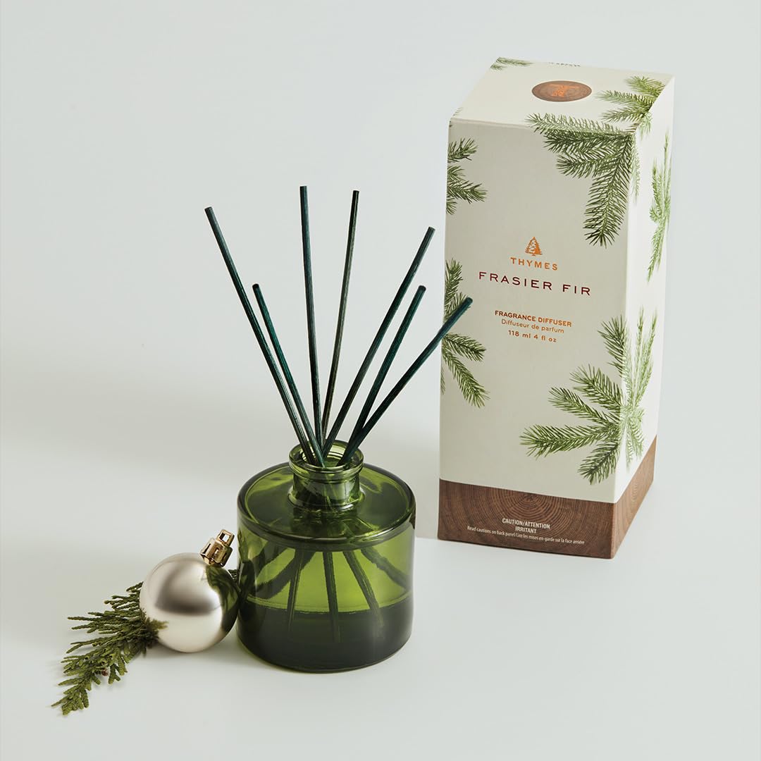 Close-up of rattan reeds absorbed in Frasier Fir fragrance for a calming atmosphere.