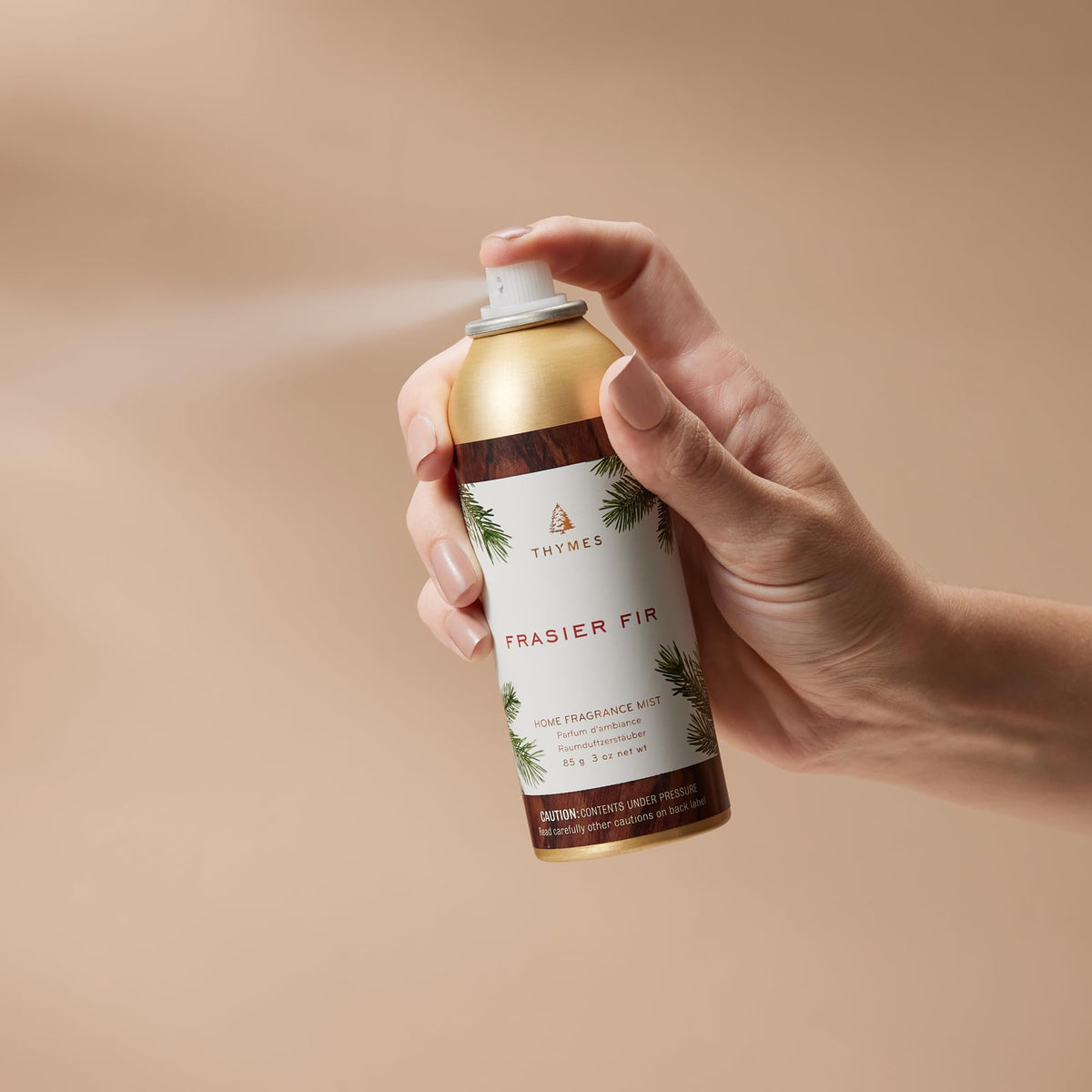 Thymes Frasier Fir mist spray action, reviving a room with pine and cedarwood