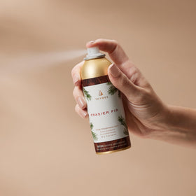 Thymes Frasier Fir mist spray action, reviving a room with pine and cedarwood