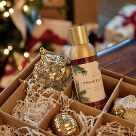 Thymes Frasier Fir notes Siberian needles with cedarwood and sandalwood in mist