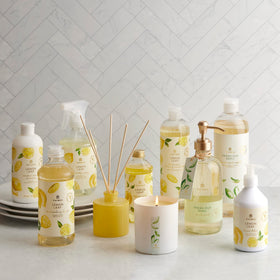 Thymes Lemon Leaf notes including bergamot and lily elevate home fragrance.
