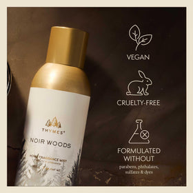 Thymes Noir Woods mist with golden glow, enhances shelf styling.