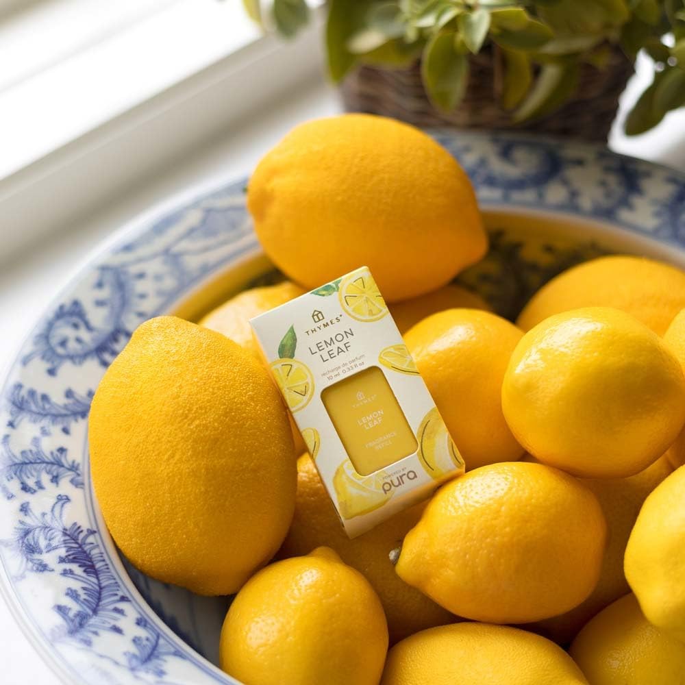 Two Pura Lemon Leaf refills ready for quick space refresh.