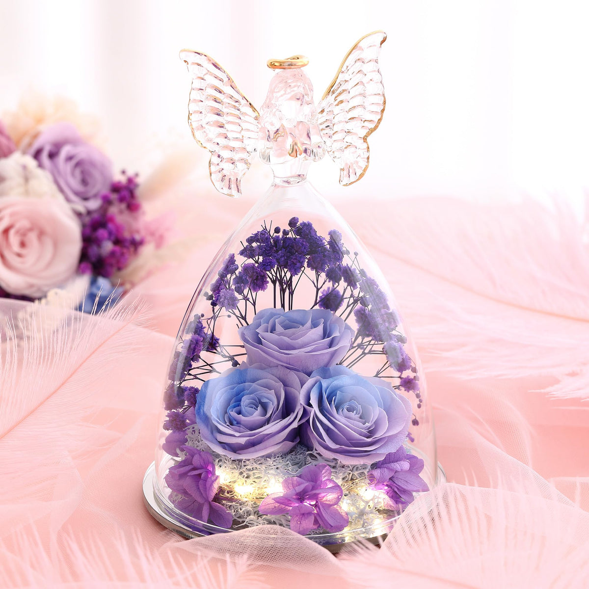 Tiaronics angel figurine with rose inside creates a romantic decorative piece.