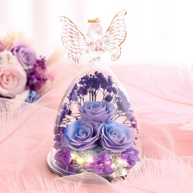 Tiaronics angel figurine with rose inside creates a romantic decorative piece.