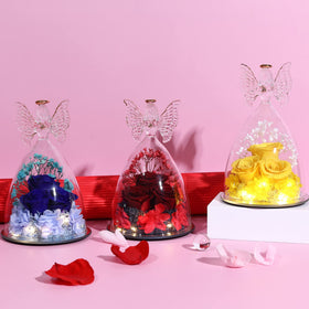 Tiaronics dark-blue glass angel with roses, adds a serene accent