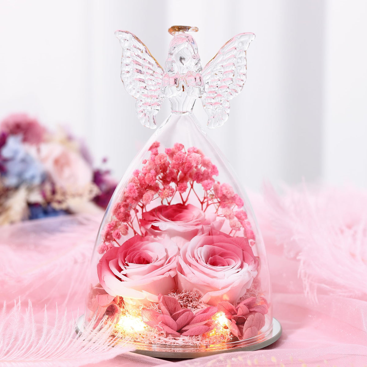 Mantel decor featuring Tiaronics rose angel centerpiece for home style.