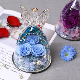 Tiaronics glass angel stands tall for elegant shelf decor.