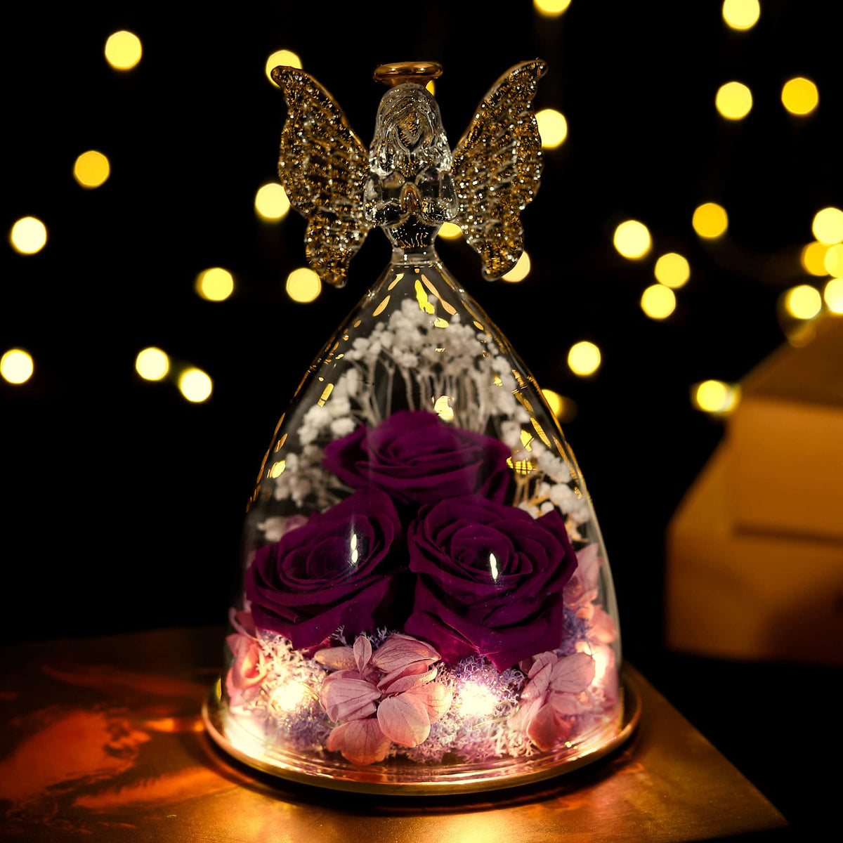 Tiaronics preserved roses inside glass angel, a unique gift idea that lasts beyond the moment.