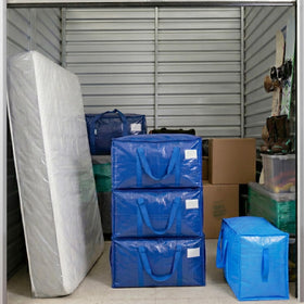 TICONN blue heavy-duty storage bag ready for moving and storage