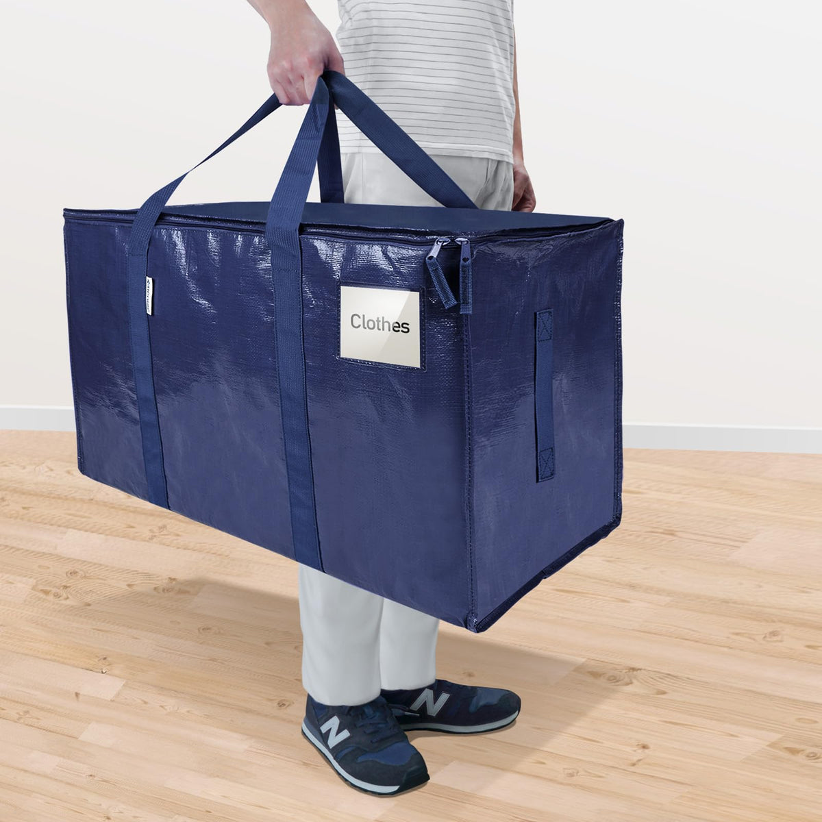 TICONN navy moving bags showing wide carrying handles for easy lifting.