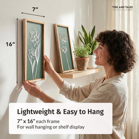 Tide and Tales sage green decor suited for humid bathrooms with durable frames.