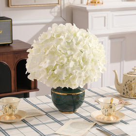 Tifuly hydrangea kissing balls and boutonnieres option for events.