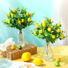 Tigeen lemon branches brighten shelves with yellow and green hues.