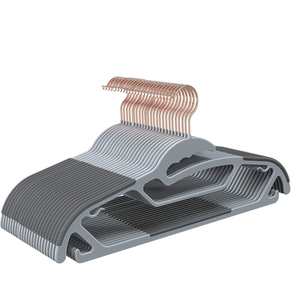 TIMMY Slim hanger with non-slip grip keeps coats securely in place.