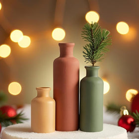 TINCTOTNIC medium vase styled with fresh stems on a modern shelf.
