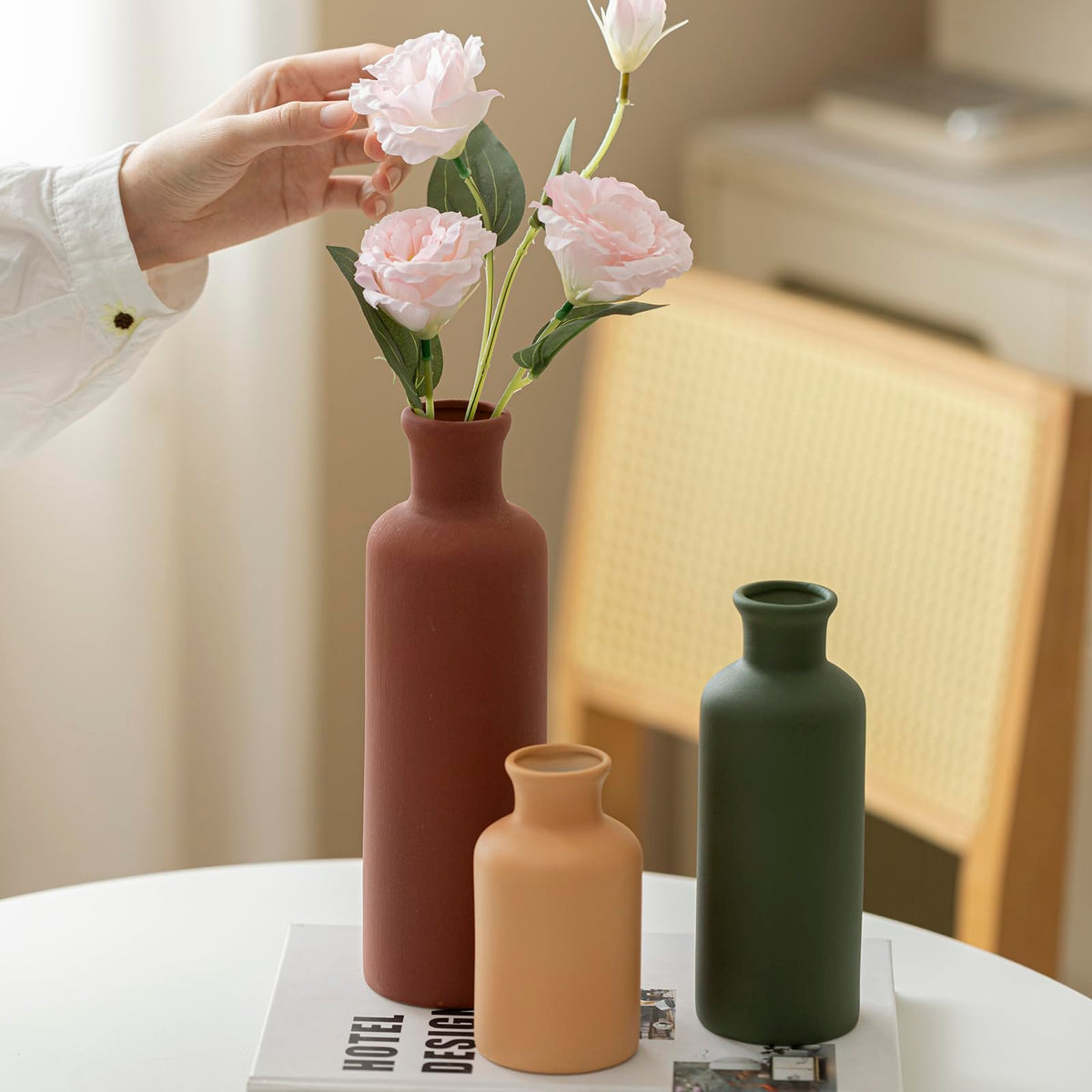 TINCTOTNIC green-mix tall vase highlighted with pampas grass for texture and height.