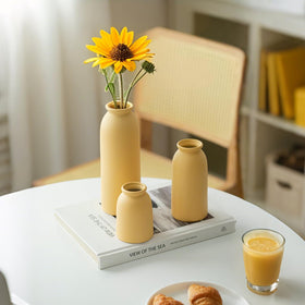 TINCTOTNIC vase with distressed matte finish adds rustic texture to interiors.
