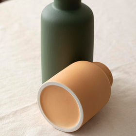 TINCTOTNIC narrow-neck vase emphasizes sleek lines for arrangements.