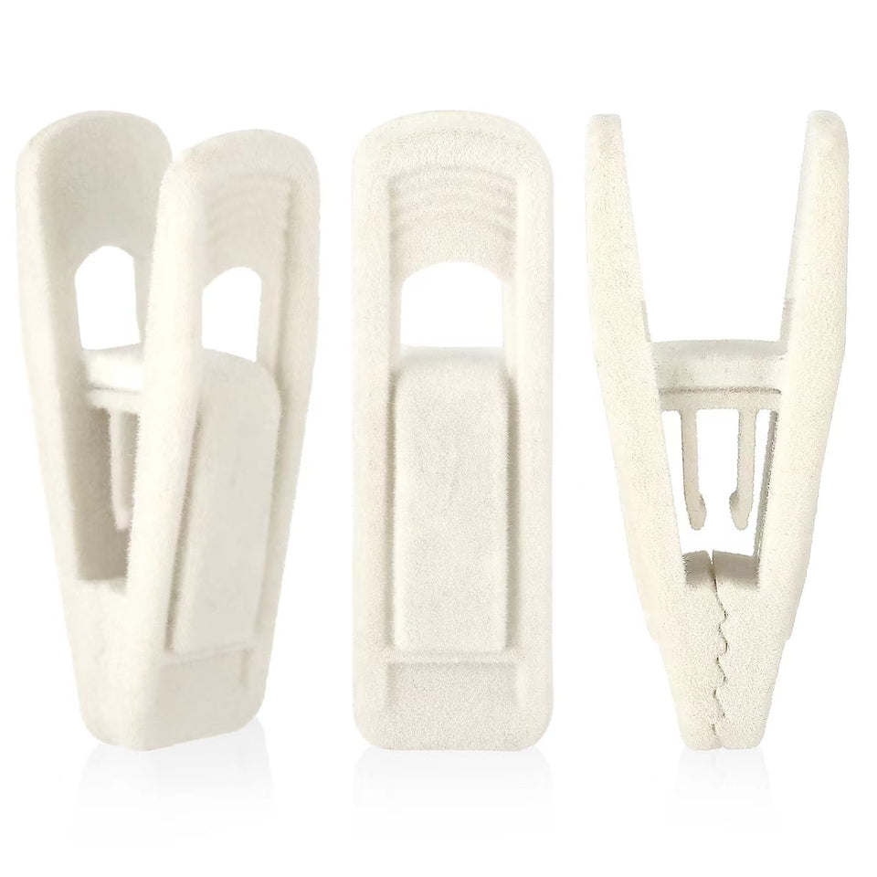 Tinfol ivory velvet hanger clips close-up securing delicate fabrics safely