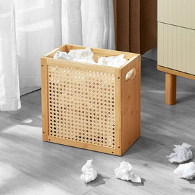 TIOPGHAD small-wicker-waste-basket showcases bamboo frame and sturdy handles for easy relocation