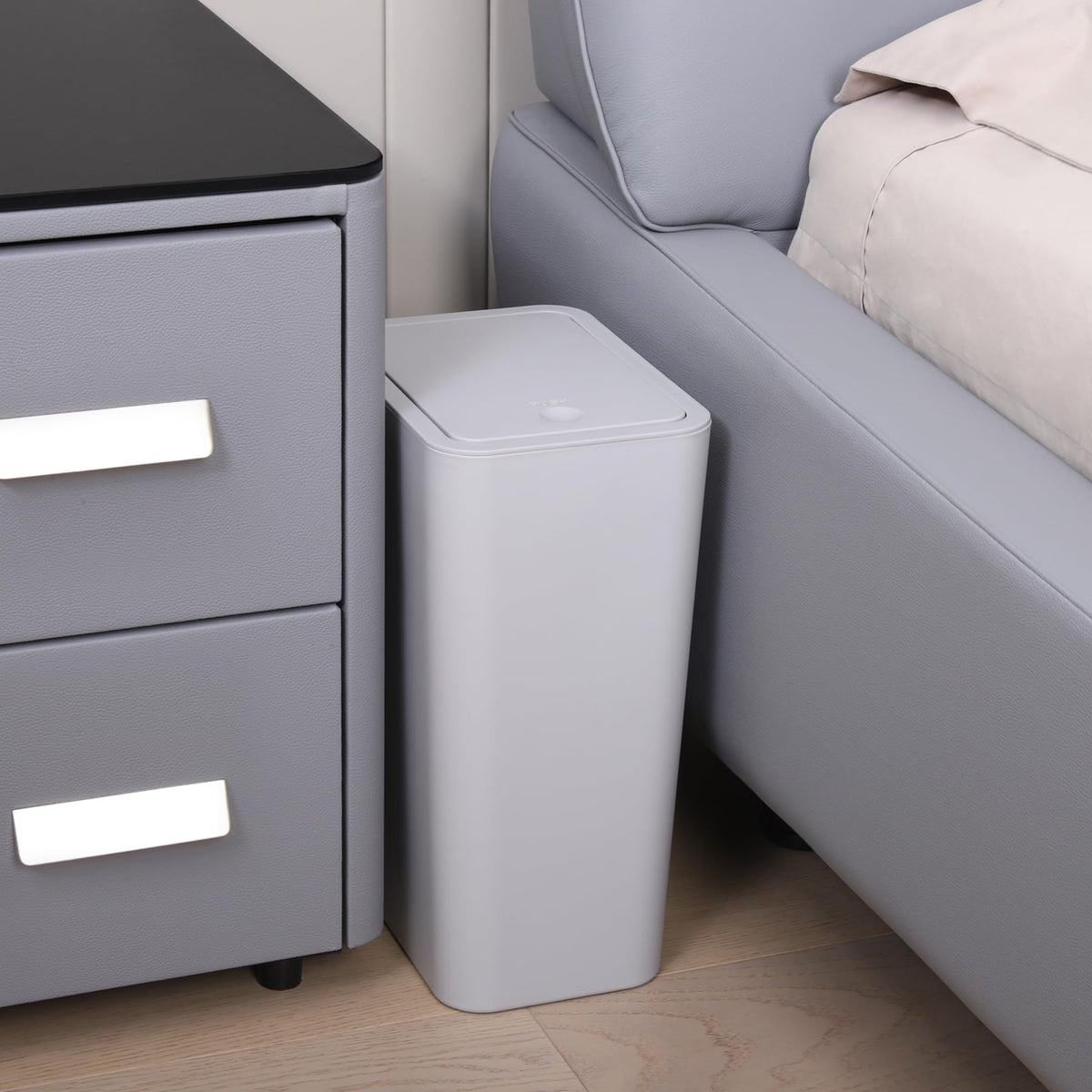 TIPGO grey trash can with pop-up lid for odor control.