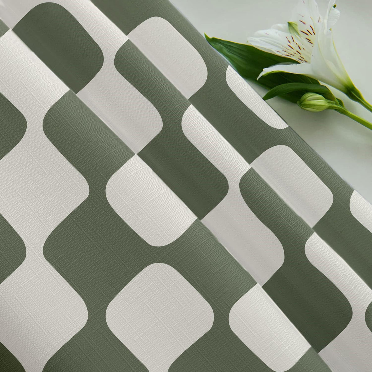 Tititex durable polyester fabric withstands humid bathroom use.
