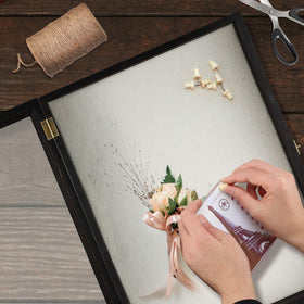 Hinged horn lock on TJ.MOREE Flowers Shadow Box provides secure, accessible display.