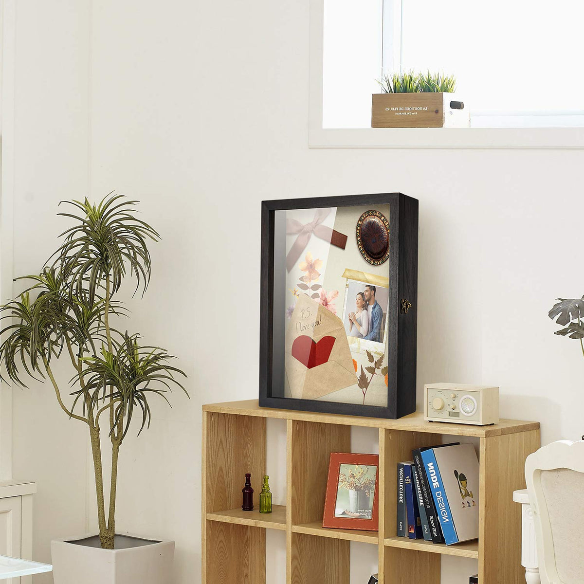 Solid wood frame of TJ.MOREE Flowers Shadow Box blends with vintage decor.