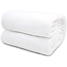 TL Care blanket on a twin bed at home for simple warmth